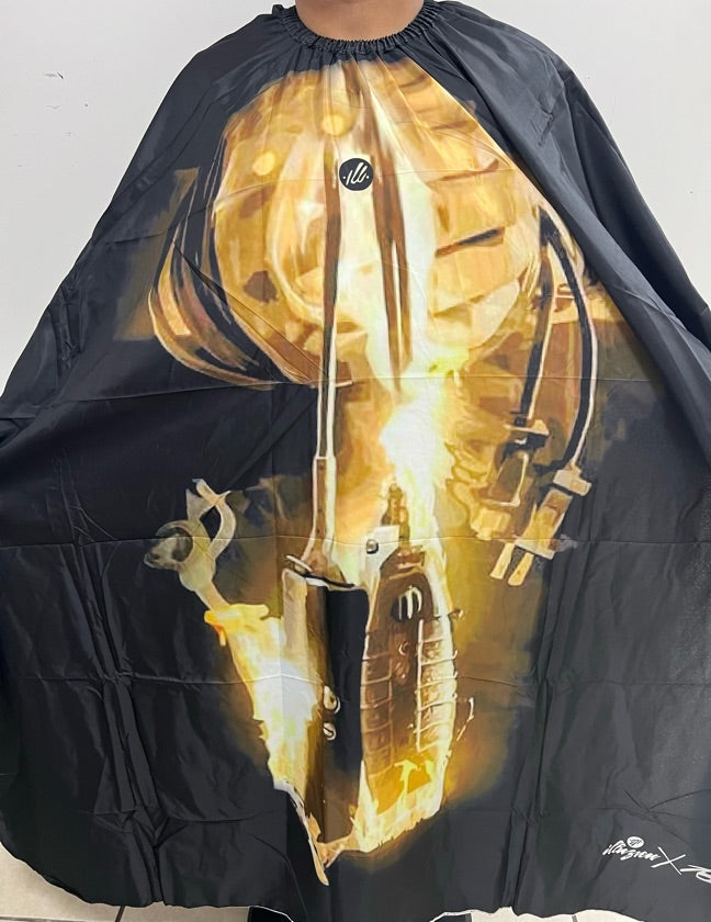 A professional salon cape featuring a striped pattern with an exclusive clipper design.