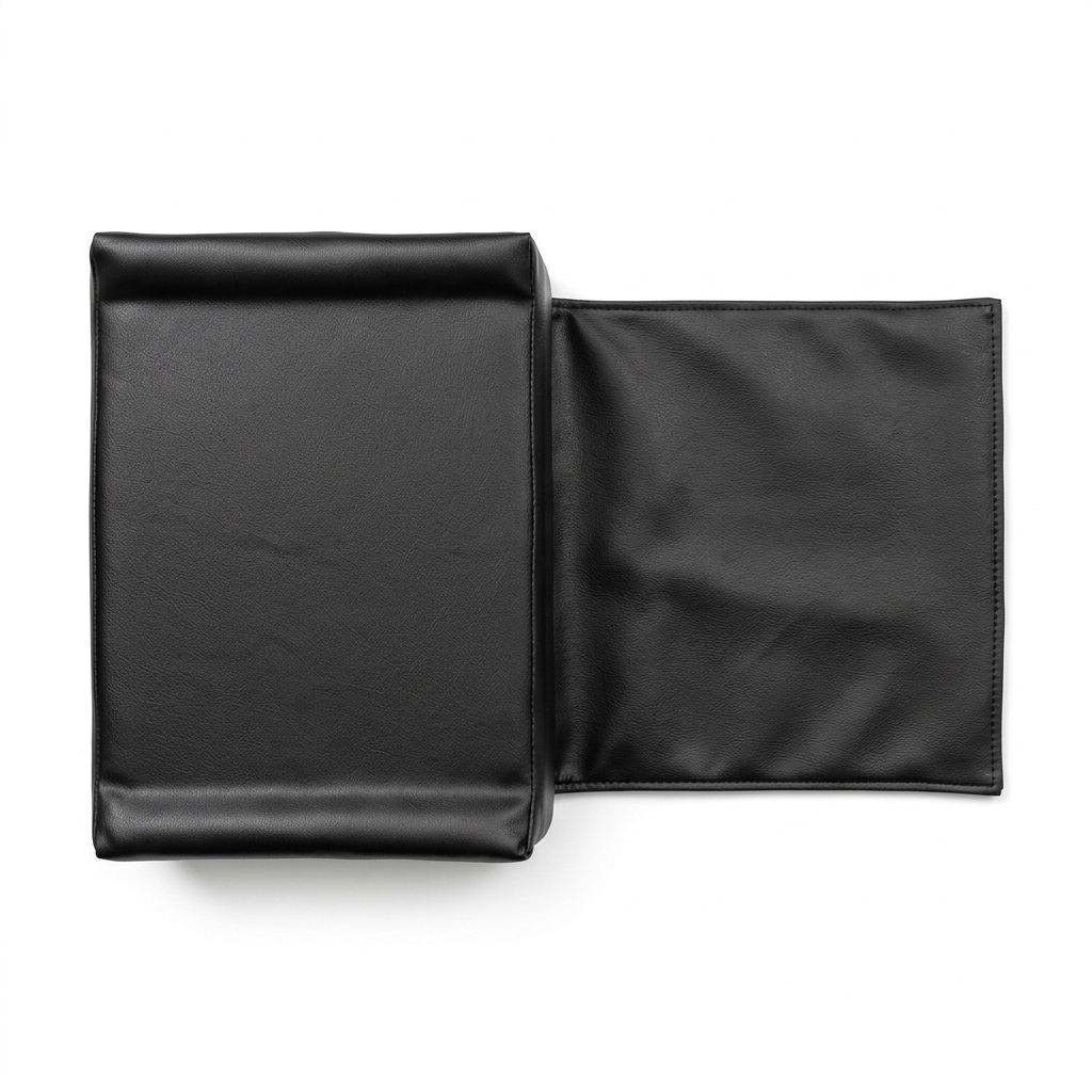 Two black leather-bound books on a white background