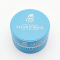 Blue container of Cream Pomade with 'Cool Style' branding on a white background