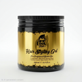 Hair styling gel jar with black and gold design on a white background