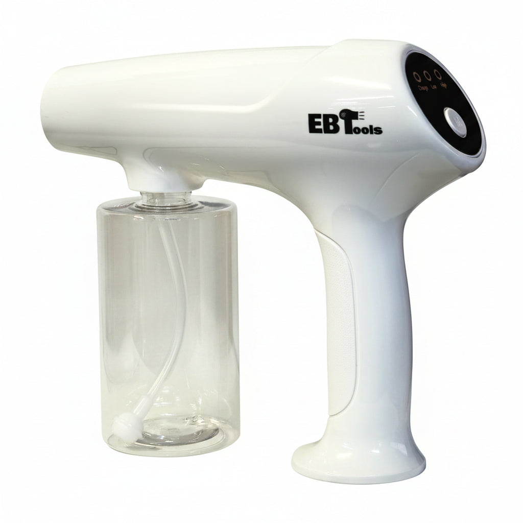 White handheld steamer with digital display on a light background