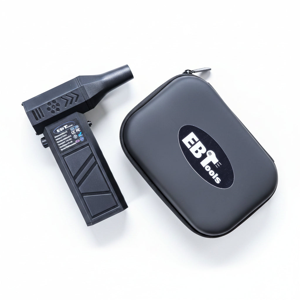 Black handheld device with a case on a wooden surface, featuring the 'EBT Tools' logo.