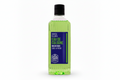 Green bottle of PXN Eau de Cologne on a white background