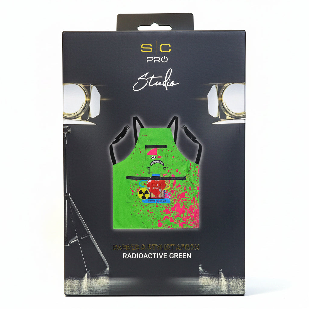 Packaged green apron with radioactive design on a black box labeled 'S/C Pro Studio'.