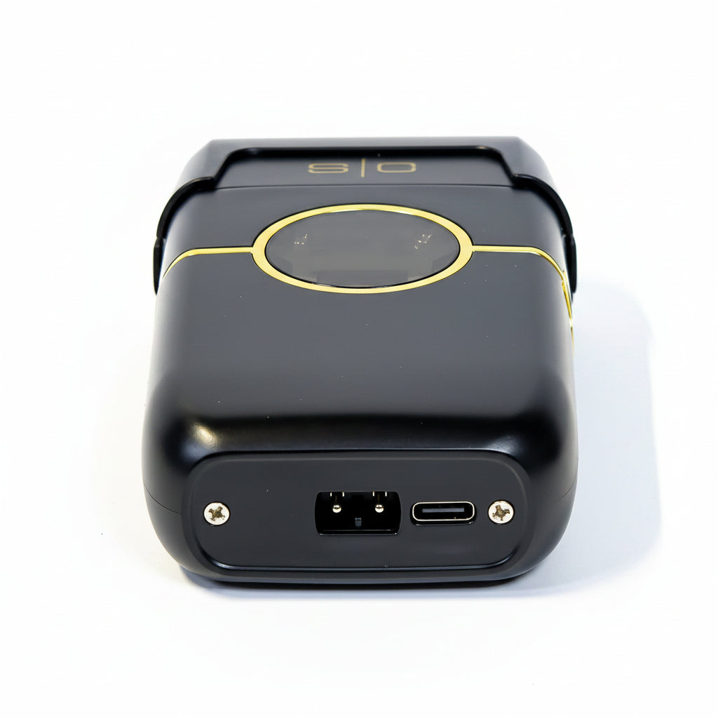 Black electronic device with USB port on a white background