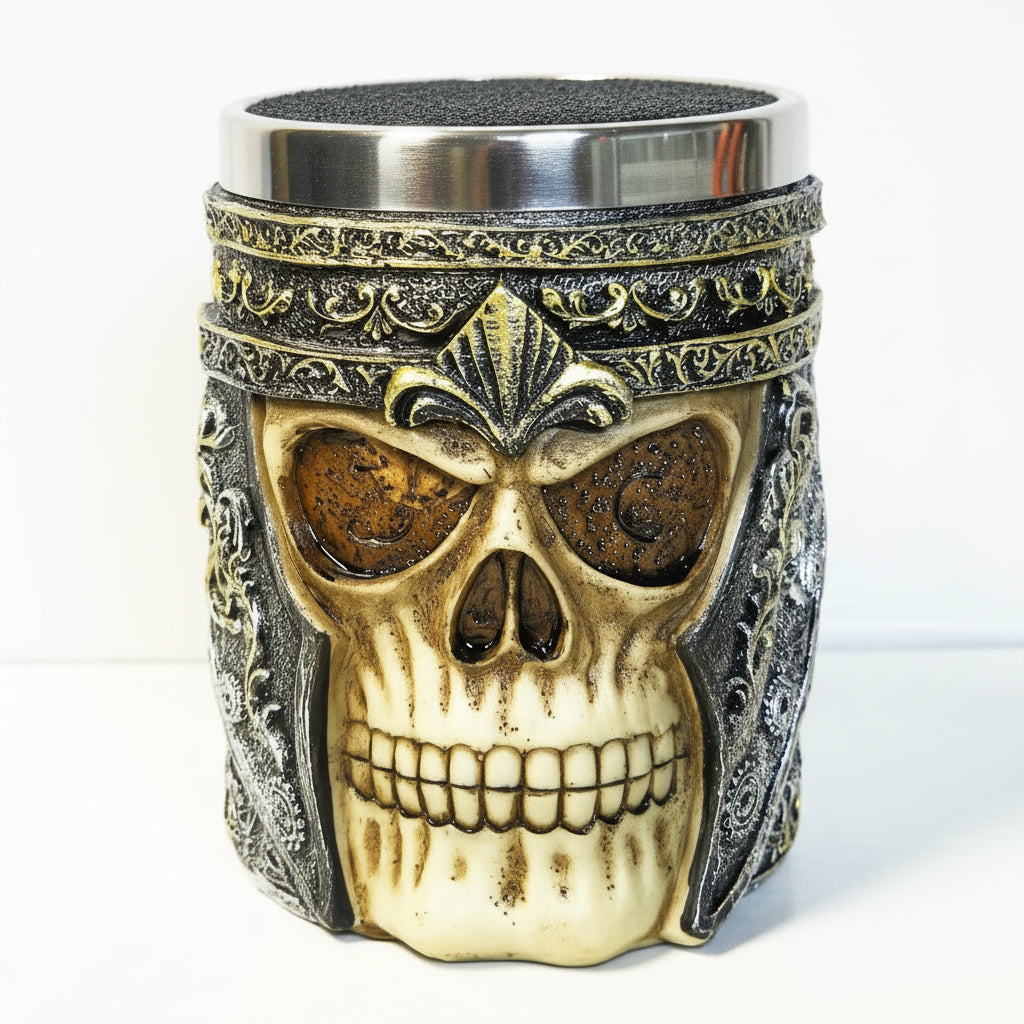 Decorative skull-shaped container with intricate designs on a white background